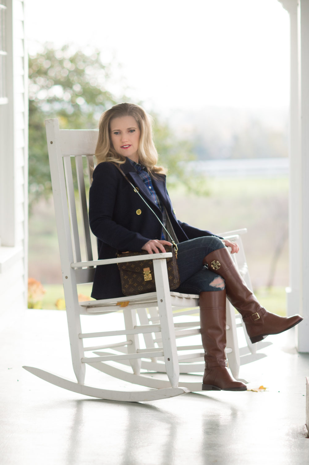 Petite Fashion and Style Blog | J.Crew Andover Peacoat | J.Crew Perfect Shirt in Navy Plaid | Tory Burch Riding Boots | Louis Vuitton Pochette Metis | Click to Read More... - A Classic Navy Peacoat styled by popular Michigan petite fashion blogger The Blue Hydrangeas
