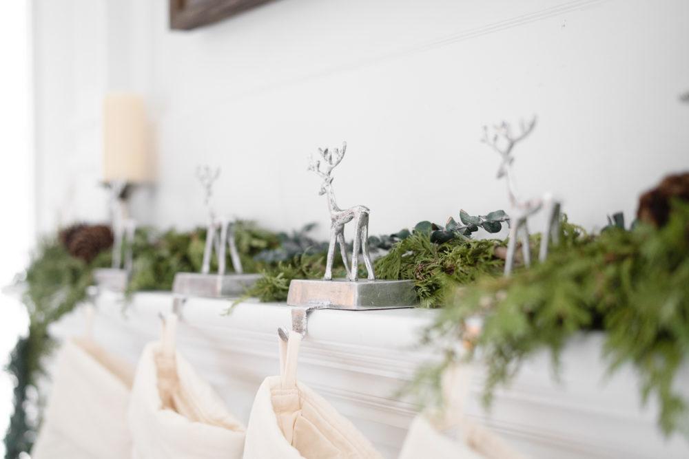 Petite Fashion Blog | Our Home For the Holidays | Eliza J. Velvet Dress | Flocked Christmas Tree | Pottery Barn Plaid Plates | Natural Cedar Garland