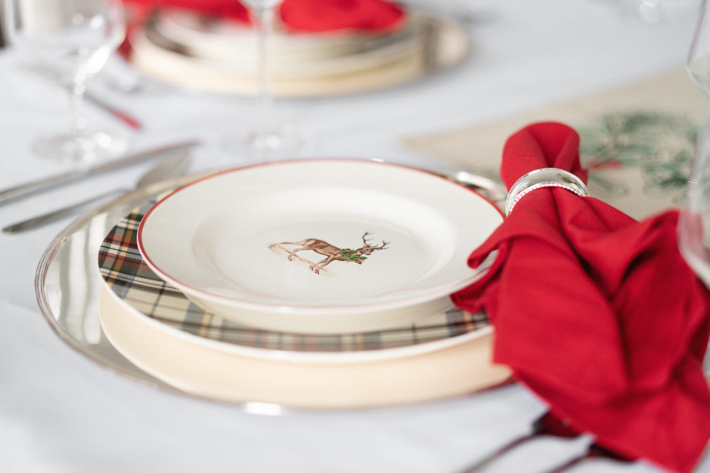 Petite Fashion Blog | Our Home For the Holidays | Eliza J. Velvet Dress | Flocked Christmas Tree | Pottery Barn Plaid Plates | Natural Cedar Garland