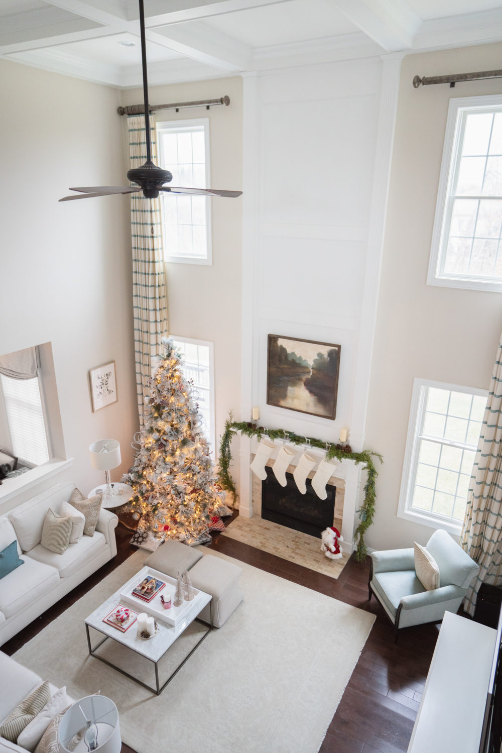 Petite Fashion Blog | Our Home For the Holidays | Eliza J. Velvet Dress | Flocked Christmas Tree | Pottery Barn Plaid Plates | Natural Cedar Garland
