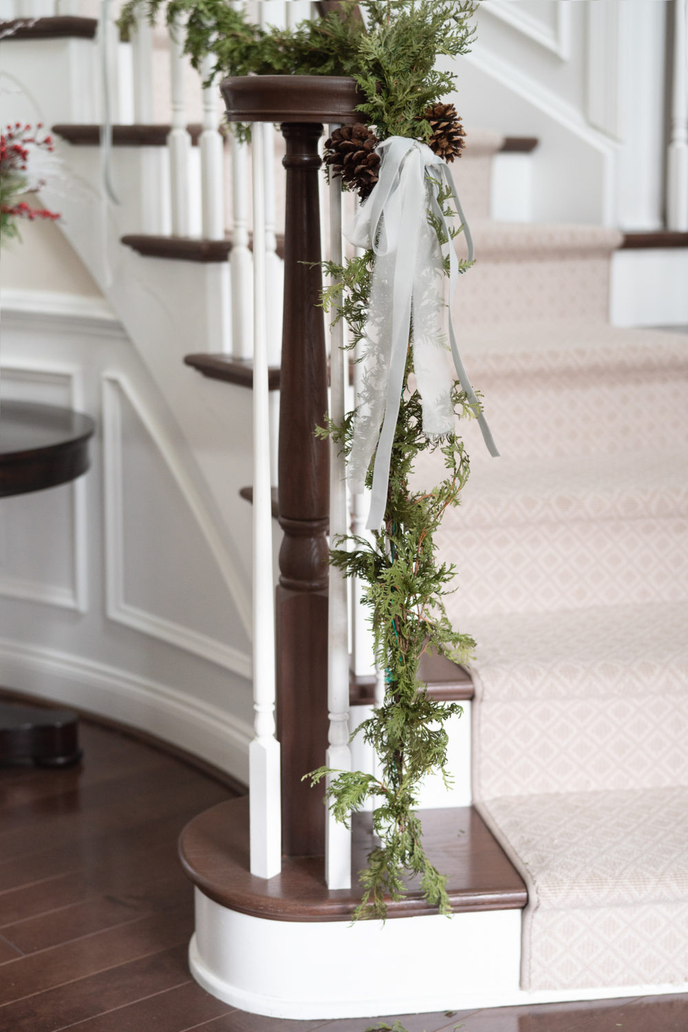 Petite Fashion Blog | Our Home For the Holidays | Eliza J. Velvet Dress | Flocked Christmas Tree | Pottery Barn Plaid Plates | Natural Cedar Garland