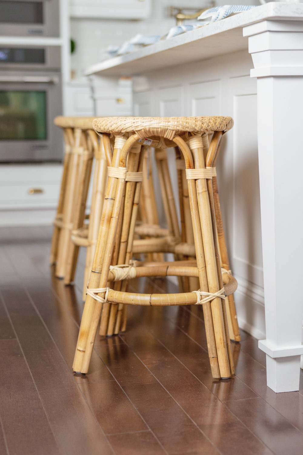 Petite Fashion Blog | Serena and Lily Riviera Counter Stools | White Kitchen | Shaker Cabinets