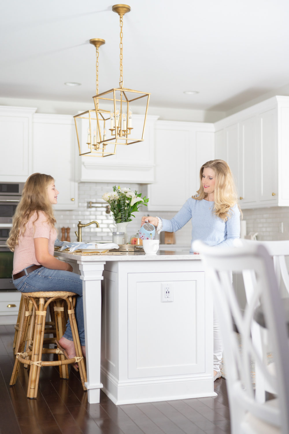 Petite Fashion Blog | Serena and Lily Riviera Counter Stools | White Kitchen | Shaker Cabinets