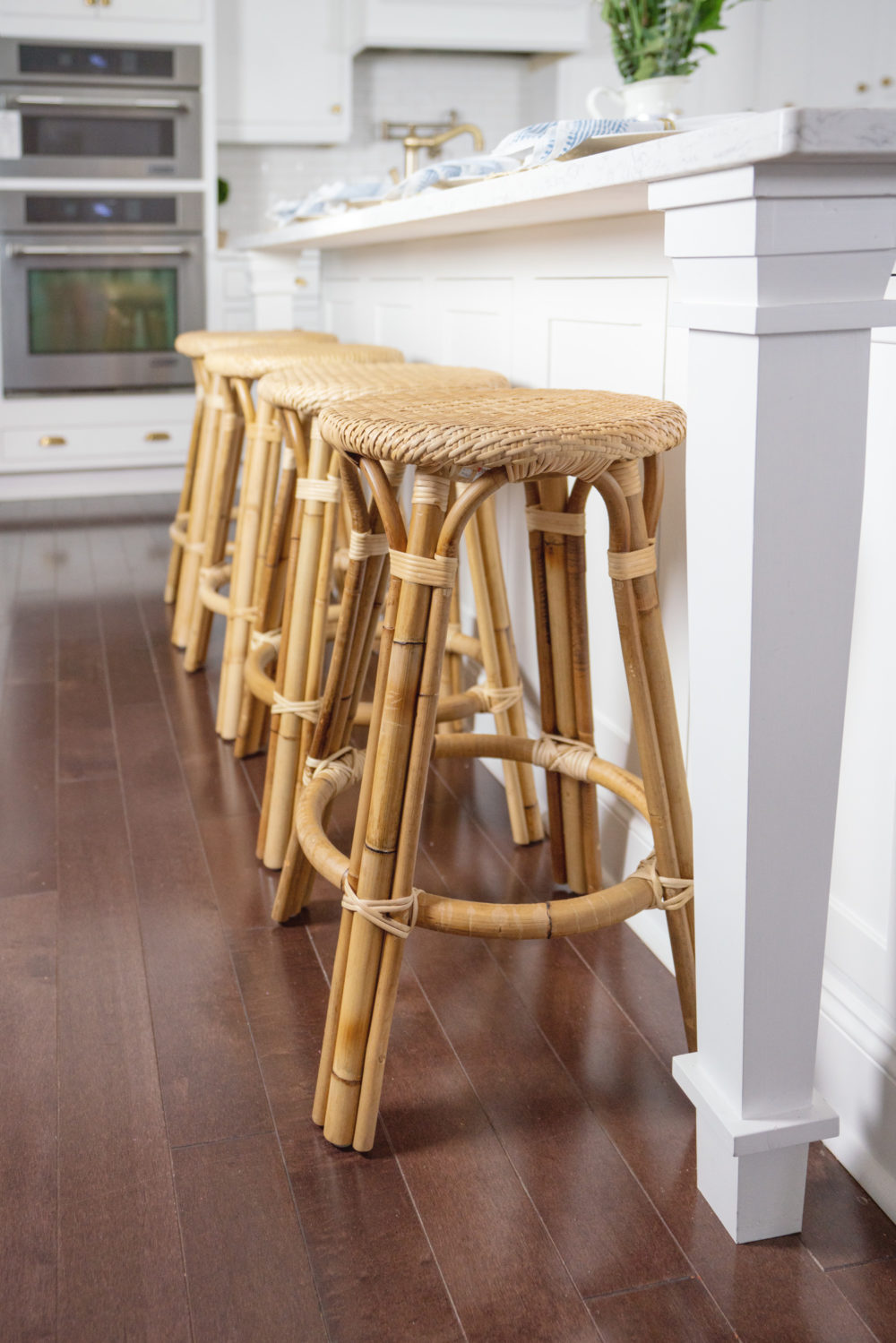 Petite Fashion Blog | Serena and Lily Riviera Counter Stools | White Kitchen | Shaker Cabinets