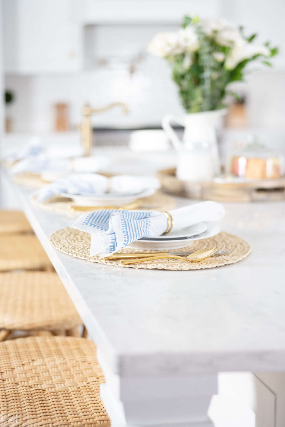 Petite Fashion Blog | Serena and Lily Riviera Counter Stools | White Kitchen | Shaker Cabinets
