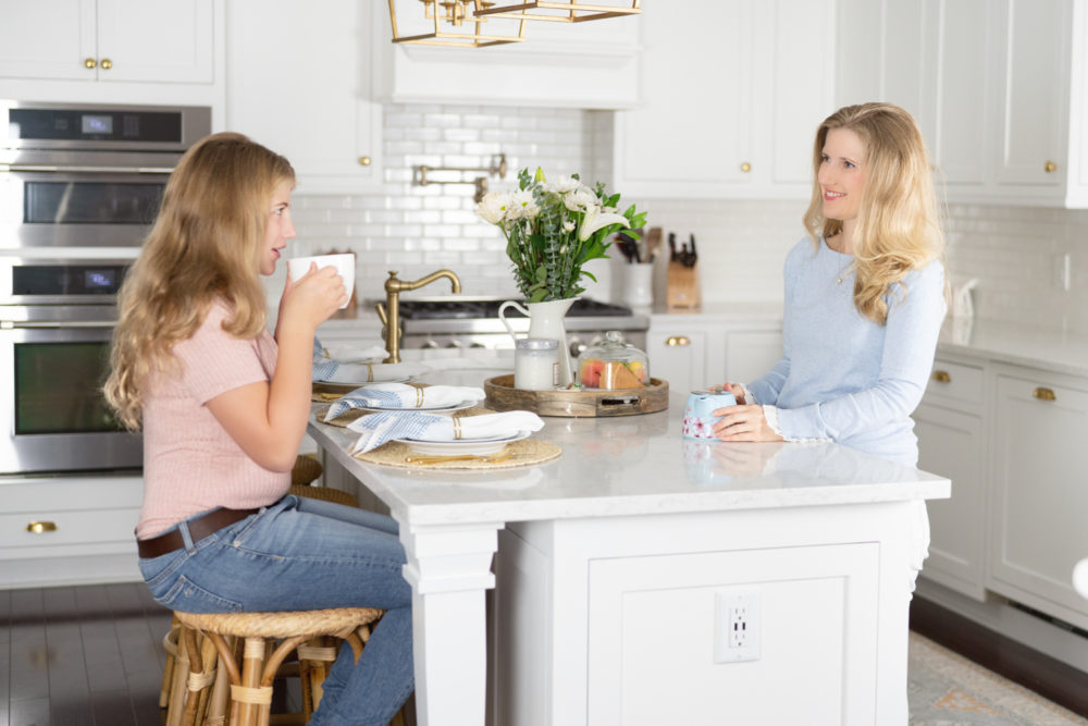Petite Fashion Blog | Serena and Lily Riviera Counter Stools | White Kitchen | Shaker Cabinets