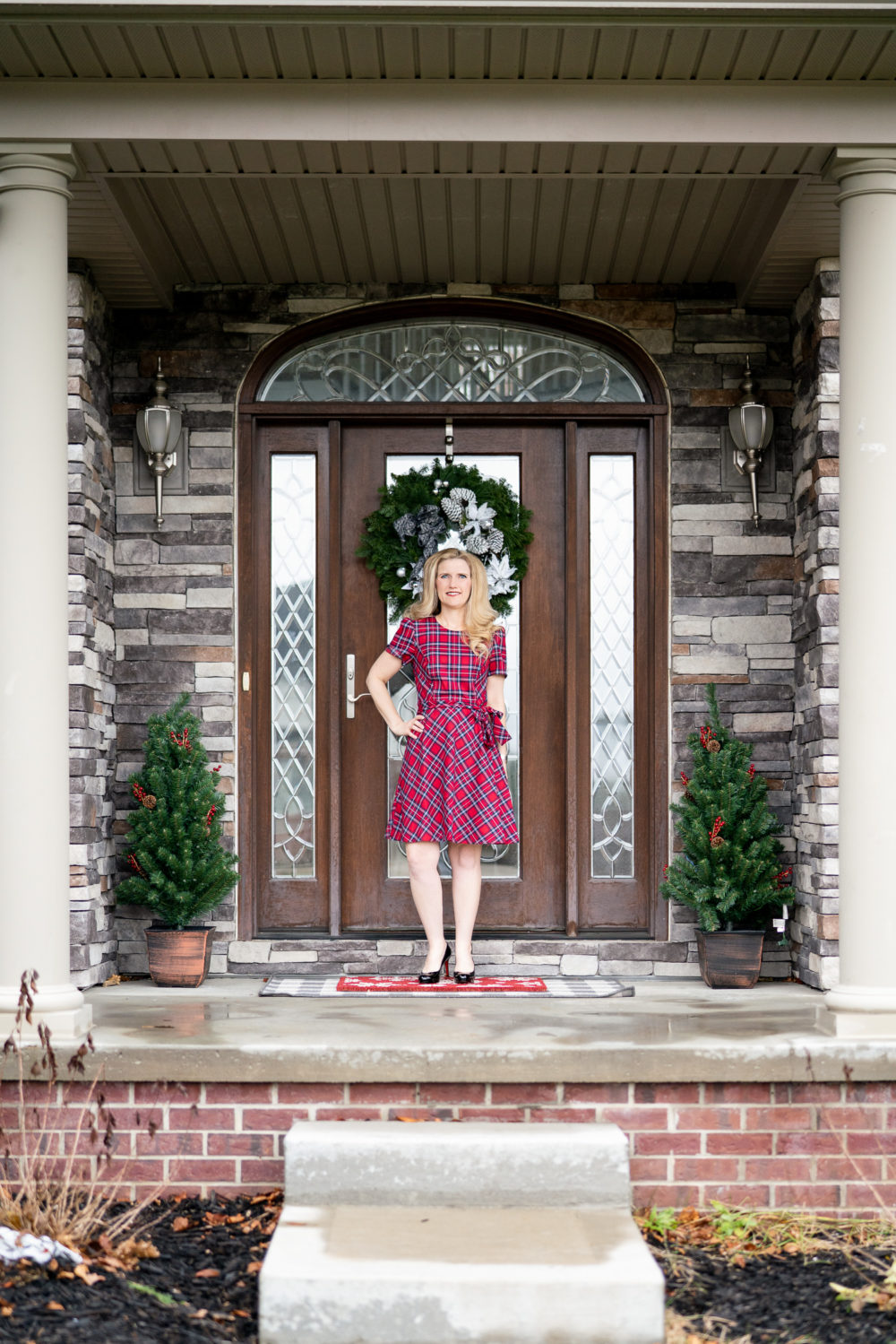 Petite Fashion Blog | Our Home for the Holidays | Christmas Decor | Flocked Christmas Tree | White Kitchen