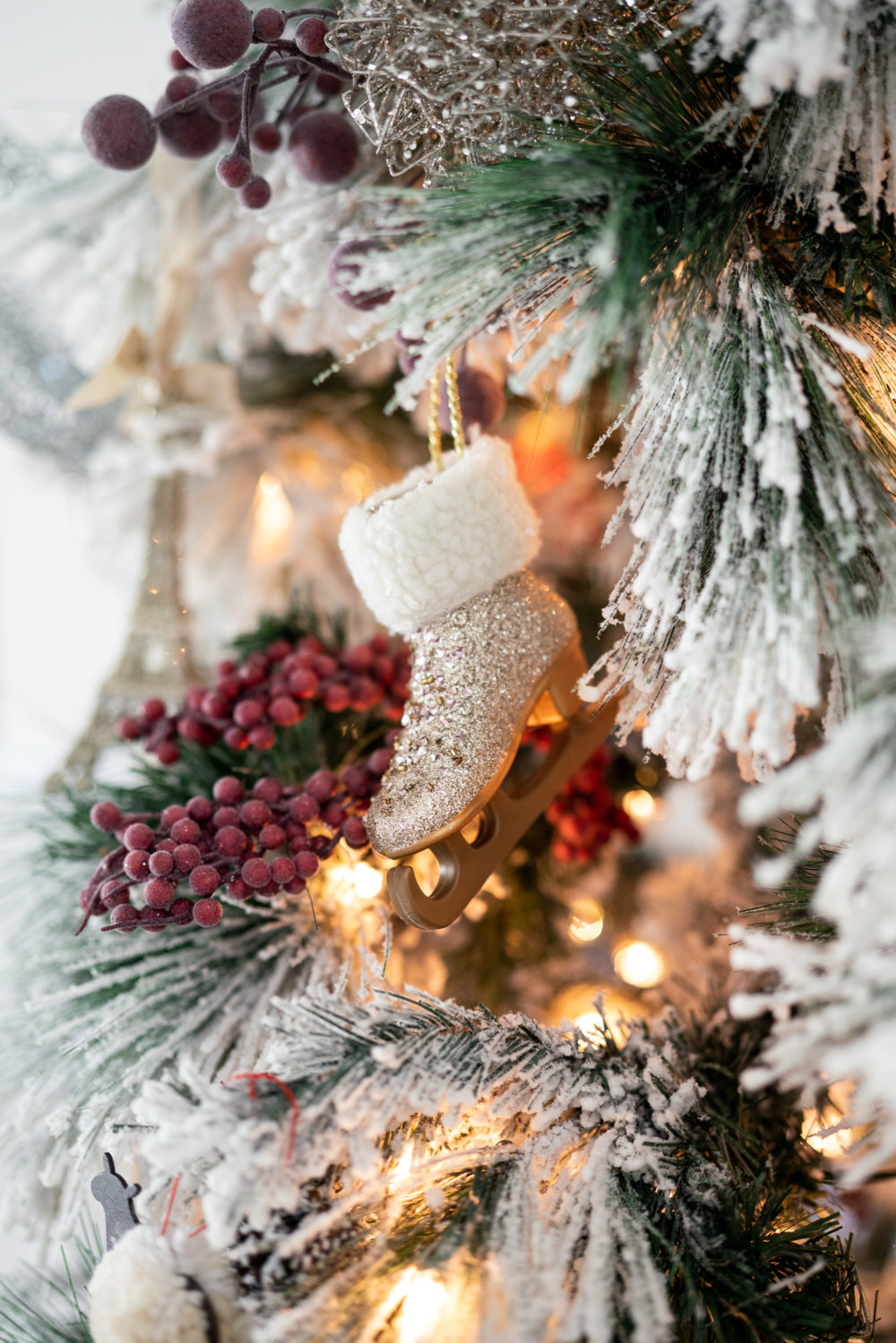 Petite Fashion Blog | Our Home for the Holidays | Christmas Decor | Flocked Christmas Tree | Christmas Pillows