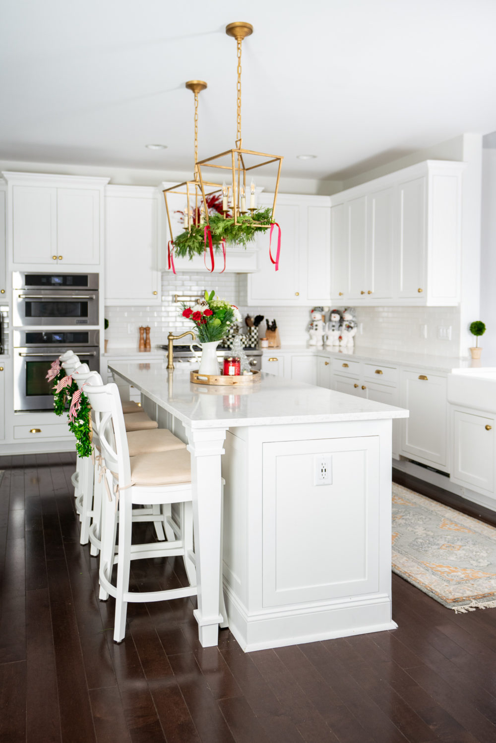 Petite Fashion Blog | Our Home for the Holidays | Christmas Decor | Flocked Christmas Tree | White Kitchen 