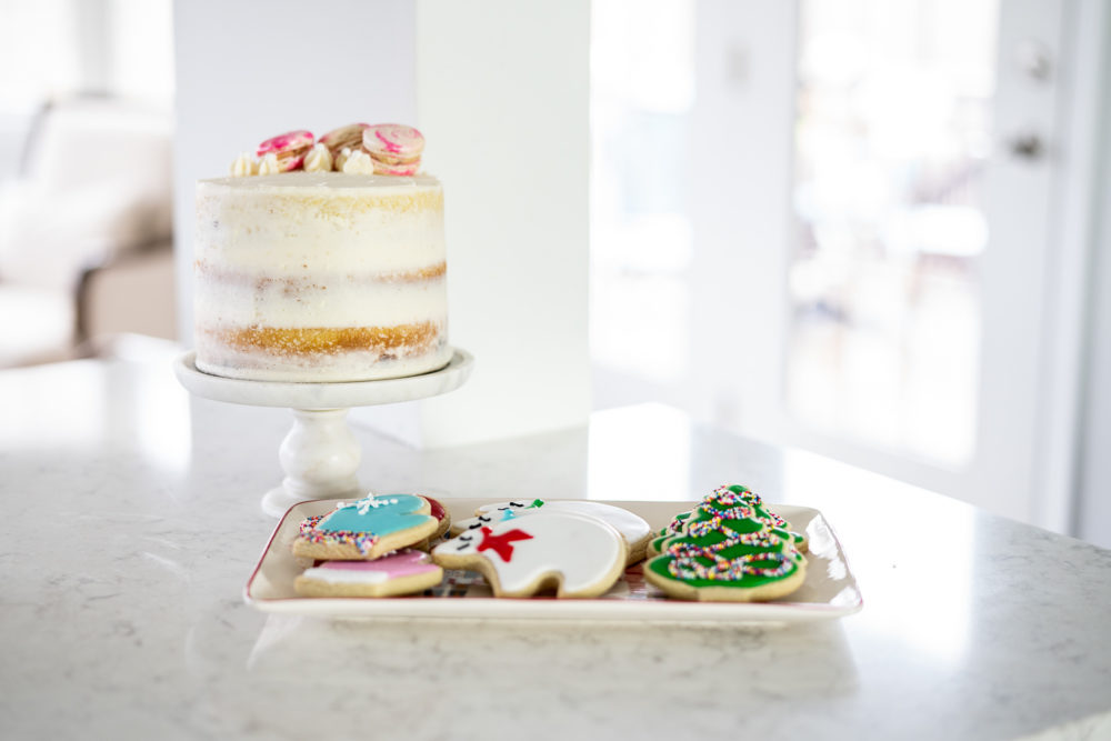 Petite Fashion Blog | Our Home for the Holidays | Christmas Decor | Flocked Christmas Tree | White Kitchen 