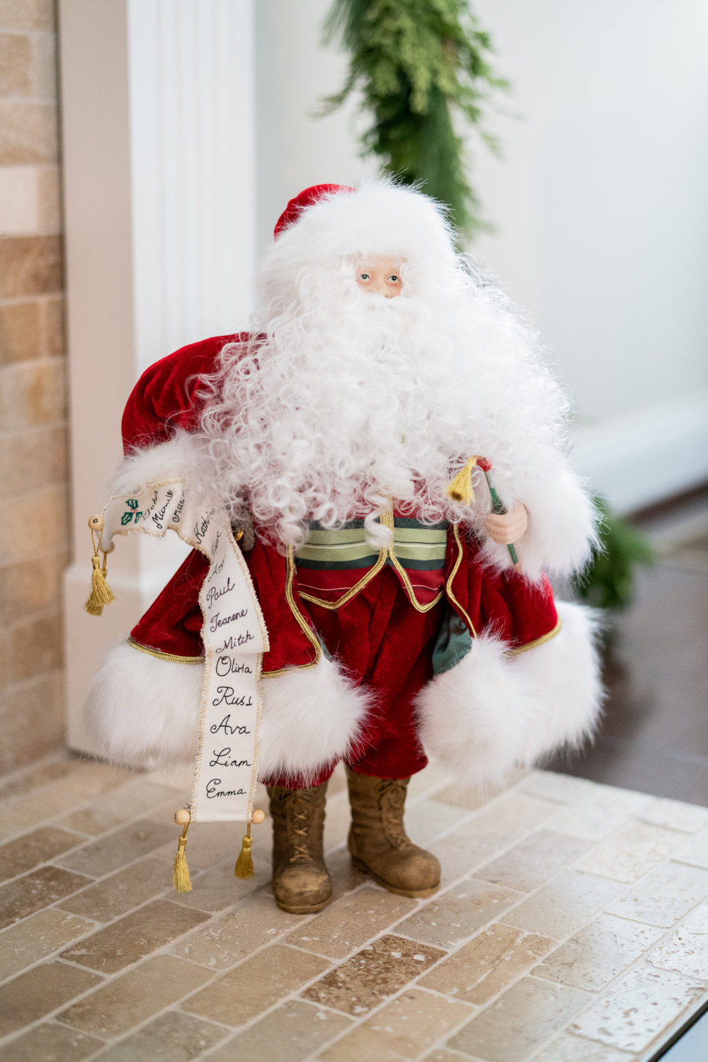 Petite Fashion Blog | Our Home for the Holidays | Christmas Decor | Flocked Christmas Tree | Santa Statue
