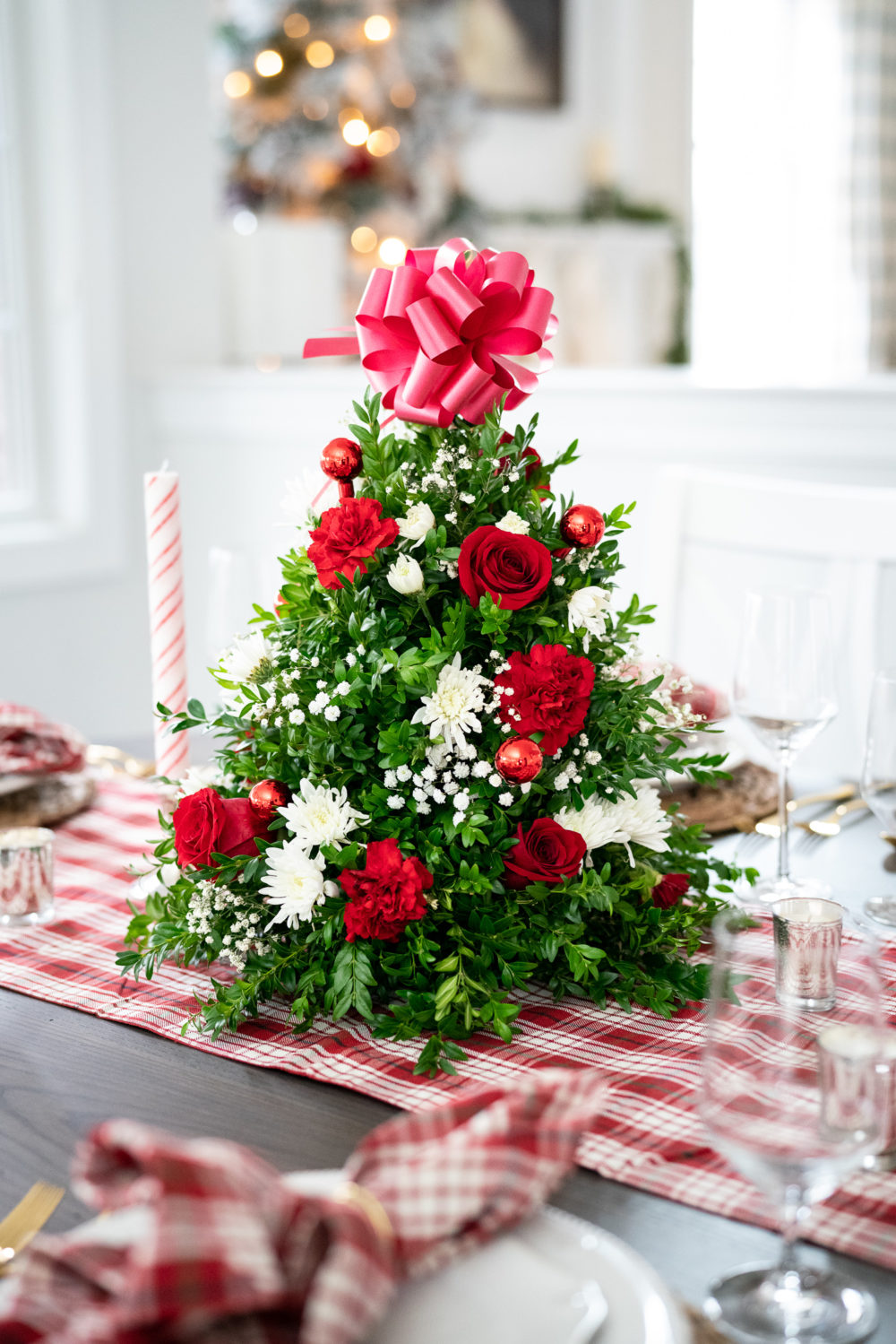 Petite Fashion Blog | Our Home for the Holidays | Christmas Decor | Flocked Christmas Tree | White Kitchen- | Juliska Berry and Thread | Juliska Holiday Dinnerware | FTD Flowers | Christmas Flowers