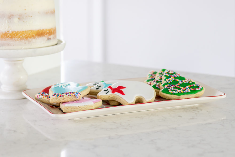 Petite Fashion Blog | Our Home for the Holidays | Christmas Decor | Flocked Christmas Tree | White Kitchen 